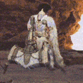 a statue of a man holding a horse in a cave