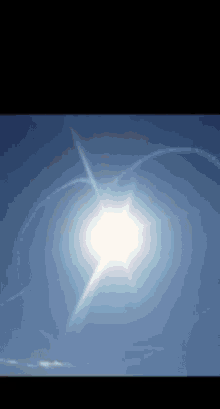 the sun shines brightly through the clouds in a blue sky