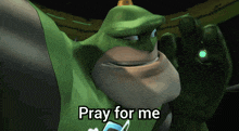 a green cartoon character with the words pray for me on the bottom