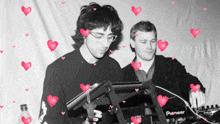 two men are playing music on a pioneer device