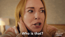 a close up of a woman 's face with the words " who is that " on the bottom