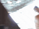 a blurry picture of a person 's face with a white background
