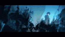 a person is standing in a dark room with a lot of smoke coming out of it .