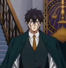 a man in a suit and tie is standing in front of a staircase