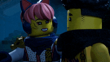 two lego characters are standing next to each other