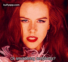 a close up of a woman 's face with the words " or smoldering temptress ? "