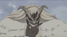 a drawing of a monster with horns and teeth