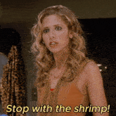 a woman says " stop with the shrimp " while looking at the camera