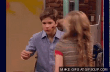 a gif of a boy and a girl with make gifs at gif soup.com