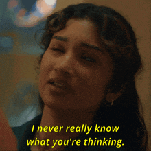 a close up of a woman with the words i never really know what you 're thinking