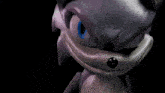 a close up of a sonic the hedgehog 's face and hands