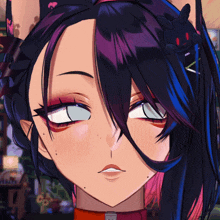 a close up of a girl 's face with a bunny ear clip in her hair