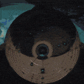 a large circular object with a sphere in the center
