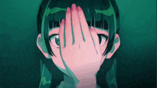 a girl with green hair covers her face with her hand