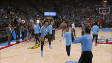 a basketball game is being played in a stadium that says rac town