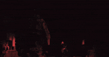 a soldier is laying on the ground in the dark