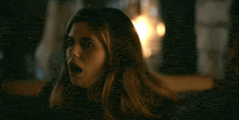 a woman with a surprised look on her face says " this is my song !! "