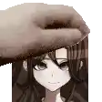 a hand is putting a hat on a woman 's head .