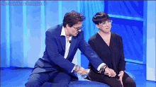 Johnny Depp Holding Hands GIF - Johnny Depp Holding Hands Give Paper GIFs