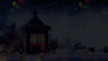a lantern with a lit candle in it is surrounded by christmas ornaments