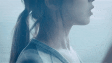 a close up of a woman 's neck and face