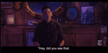a man says " hey did you see that " in front of a mirror