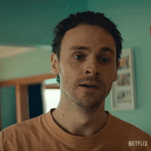 a close up of a man 's face with netflix written on the bottom