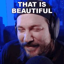a man wearing headphones with the words that is beautiful written above him