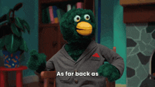a stuffed animal in a suit is sitting in a chair and says i deserved to be dead
