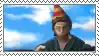 a blurred picture of a man wearing a party hat .