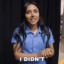 a woman in a blue shirt says " i did n't "