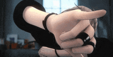 a close up of a person 's hand holding something