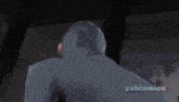 a man wearing a mask says any in front of a yahiamice logo