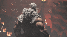 a man with a furry hood is standing in front of a fire
