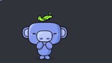a cartoon monkey with a green leaf on its head