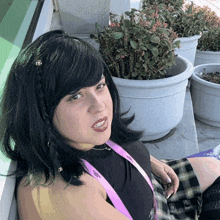 a woman with a lanyard around her neck that says ' vegas ' on it