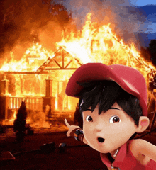 a cartoon character standing in front of a house on fire