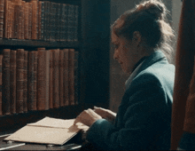 Diana Bishop Reading GIF - Diana Bishop Reading Turn Page GIFs