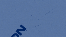 a blue background with the letter n in black