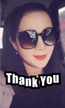 a picture of a woman wearing sunglasses with the words thank you underneath her