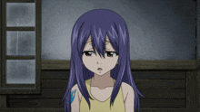 a girl with purple hair is wearing a yellow shirt