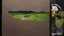 a person is painting a landscape with a brush on a canvas with the words made in animotica on the bottom