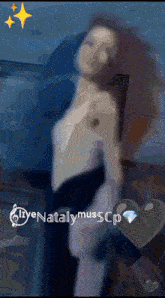 a blurry picture of a woman with the name natalymusscp