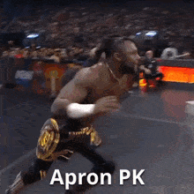 a man in a wrestling ring with the words apron pk written on it