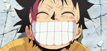 a close up of a person 's face with a big smile on it