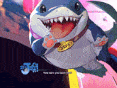a cartoon shark has a name tag that says jeff