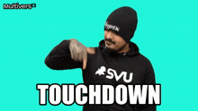 a man wearing a svu hoodie says touchdown