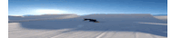 a snowboarder is doing a trick on a snowy slope