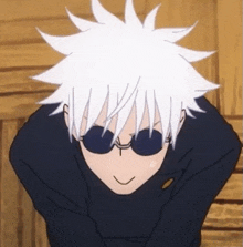 a cartoon of a boy wearing sunglasses and a black sweater .