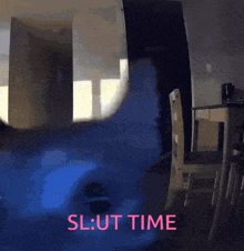 a blurred image of a room with the words slut time in pink